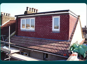 Flat Roof Dormer Construction by Top Deck Lofts in Ware