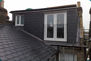 Flat Roof Dormer Construction by Top Deck Lofts in Ware